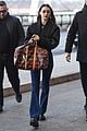 bella hadid jets from milan to nyc with cute cherry tote 03