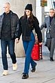 bella hadid jets from milan to nyc with cute cherry tote 05