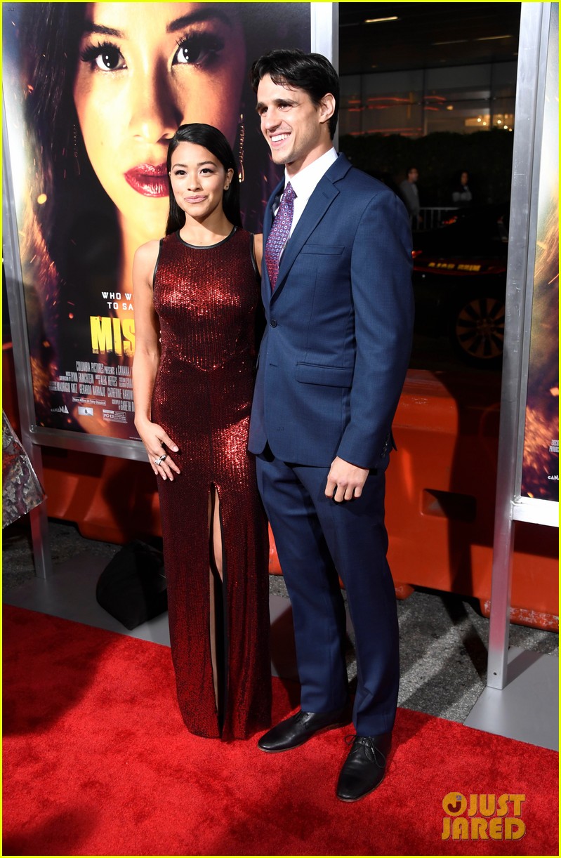 gina rodriguez supported by fiance joe locicero at miss bala premiere 05