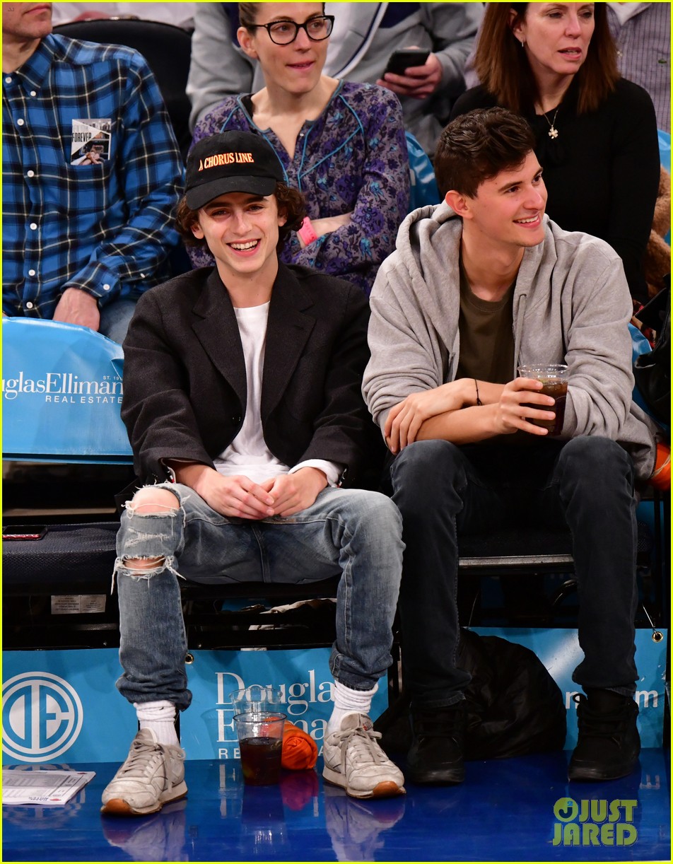 timothee chalamet spills his drink at new york knicks game 01