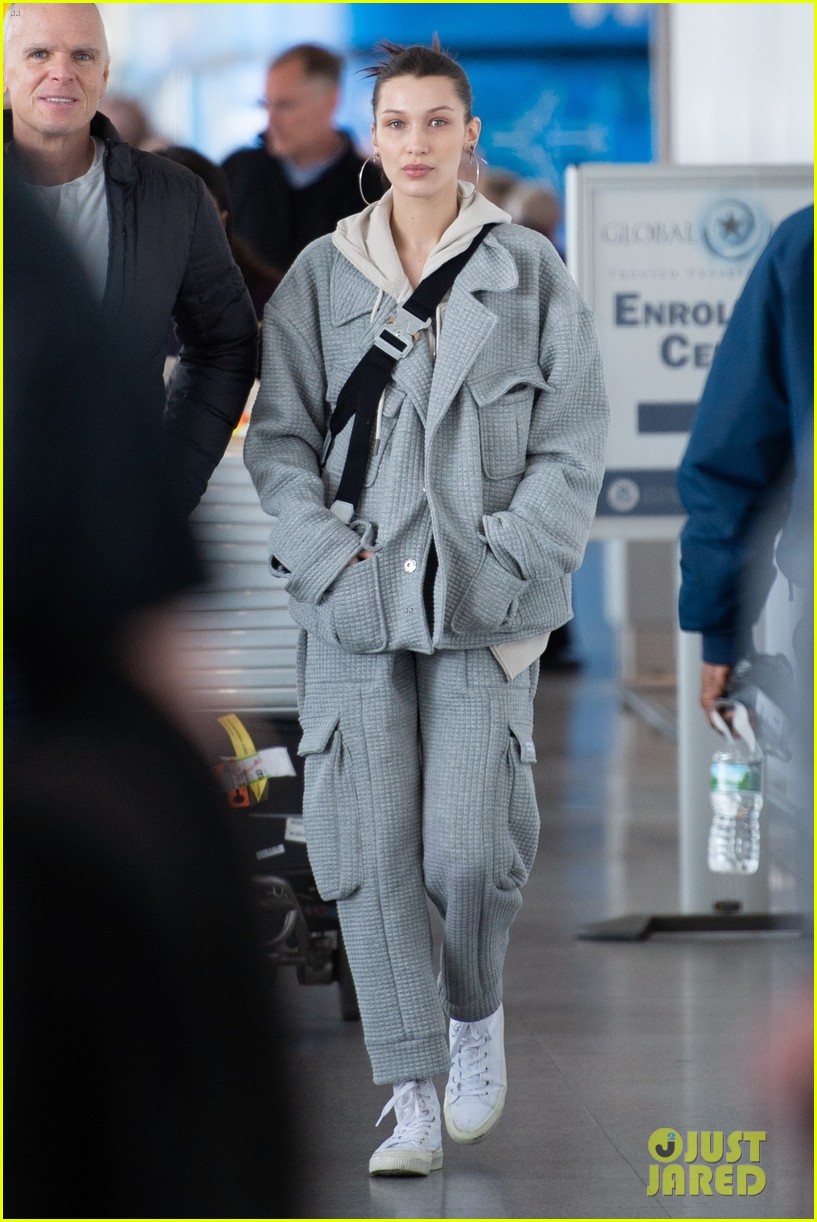 bella hadid bundles up in comfy grey suit while landing in nyc 01