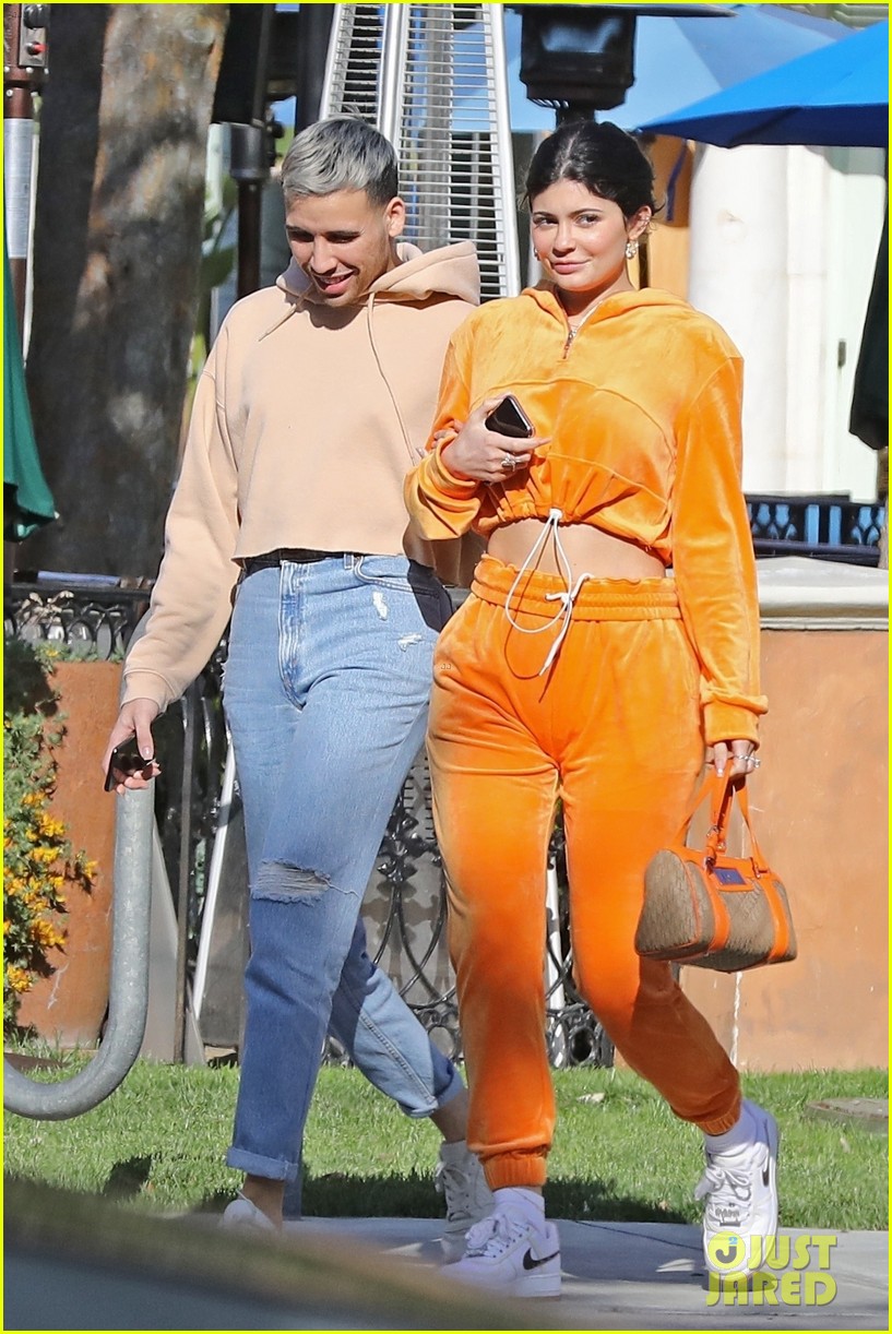 kylie jenner sports orange track suit for lunch at sugar fish 05
