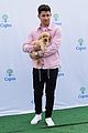 nick jonas cozies up to a puppy at cigna event 01