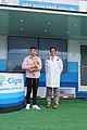 nick jonas cozies up to a puppy at cigna event 07