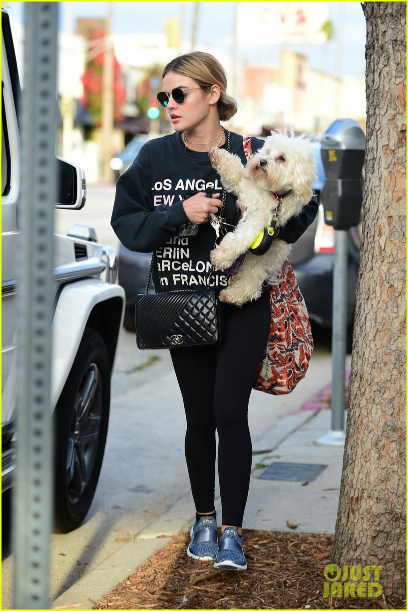 lucy hale takes her pup for a walk in la 01