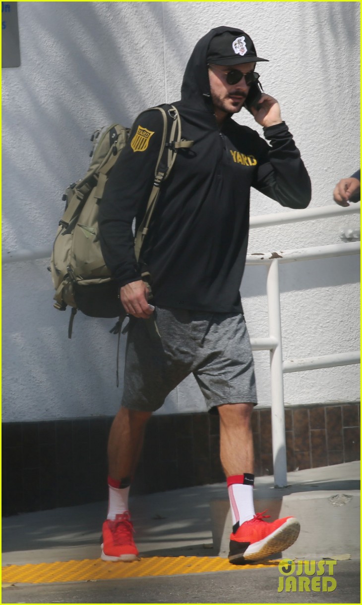 zac efron steps out after acl injury 01