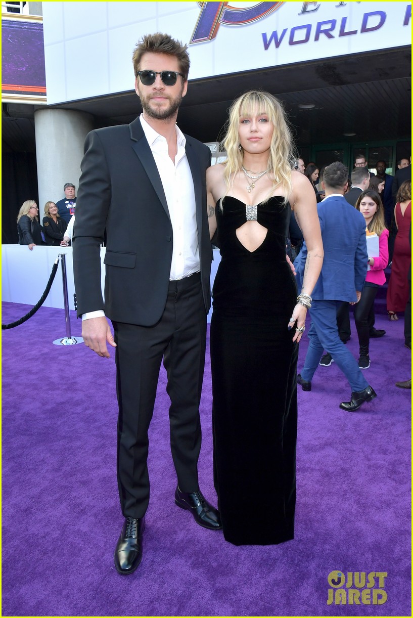 miley cyrus and liam hemsworth couple up for avengers endgame world premiere 01