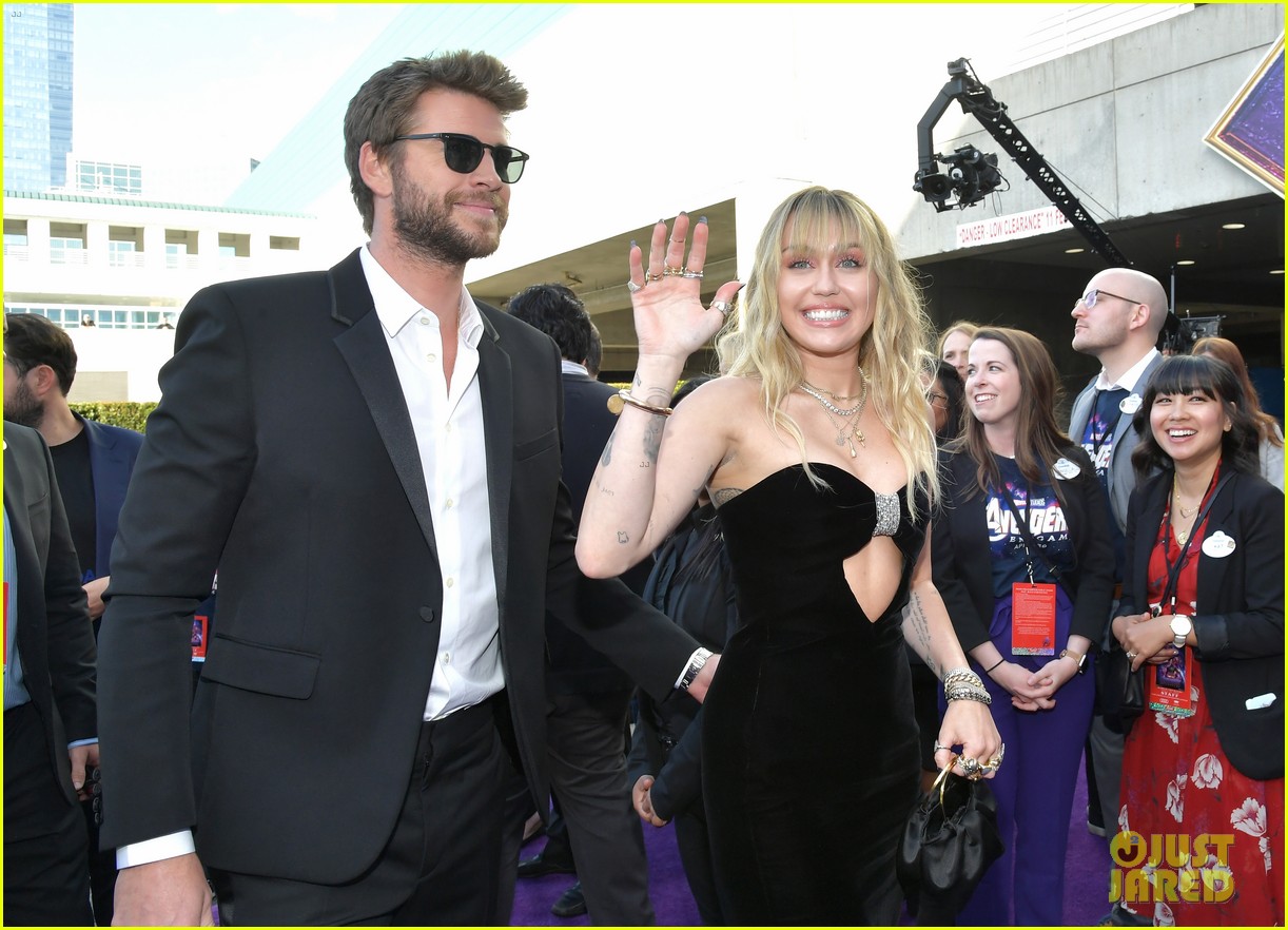 miley cyrus and liam hemsworth couple up for avengers endgame world premiere 02