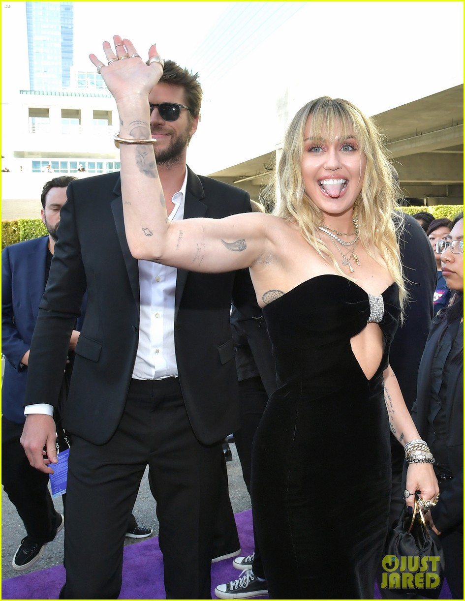 miley cyrus and liam hemsworth couple up for avengers endgame world premiere 06