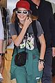 millie bobby brown rocks drakes clothing line while touching down in tokyo 03