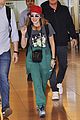 millie bobby brown rocks drakes clothing line while touching down in tokyo 04