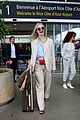 elle fanning makes chic arrival ahead of cannes film festival 01