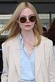 elle fanning makes chic arrival ahead of cannes film festival 02