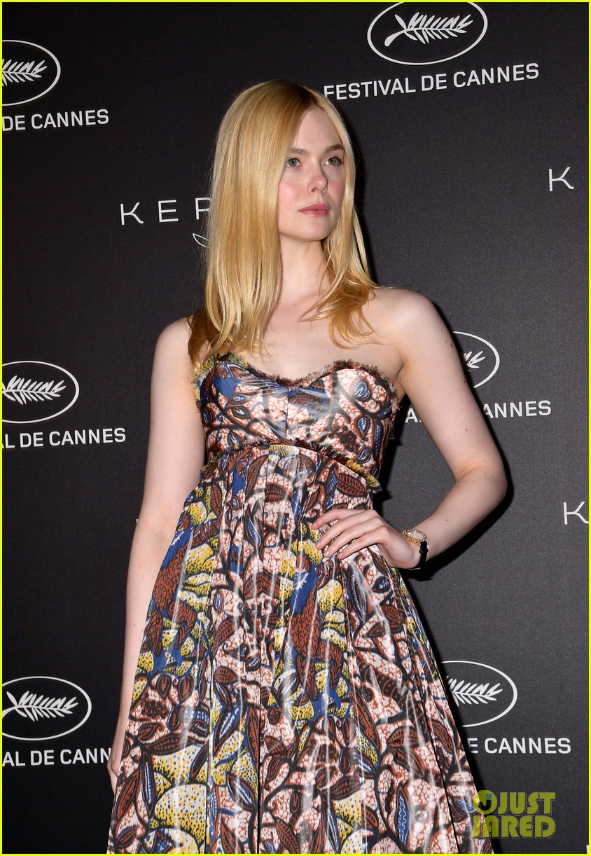 elle fanning wears a painting on her dress at kering women in motion awards 04