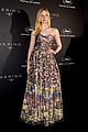 elle fanning wears a painting on her dress at kering women in motion awards 07