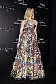 elle fanning wears a painting on her dress at kering women in motion awards 09