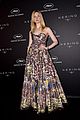 elle fanning wears a painting on her dress at kering women in motion awards 10