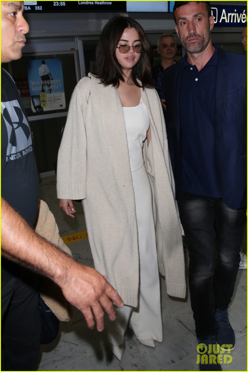 selena gomez arrives at airport for cannes 11