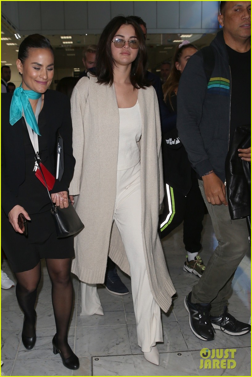 selena gomez arrives at airport for cannes 12