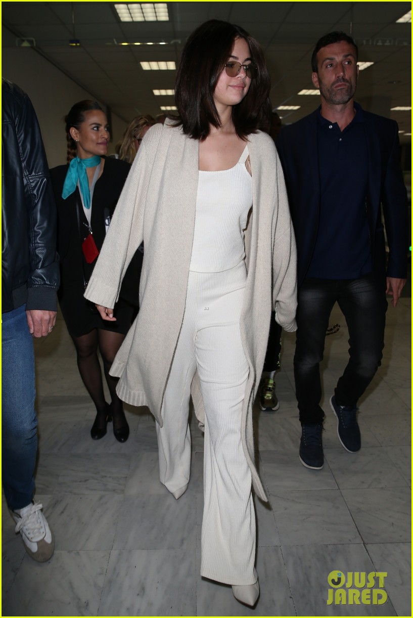 selena gomez arrives at airport for cannes 24