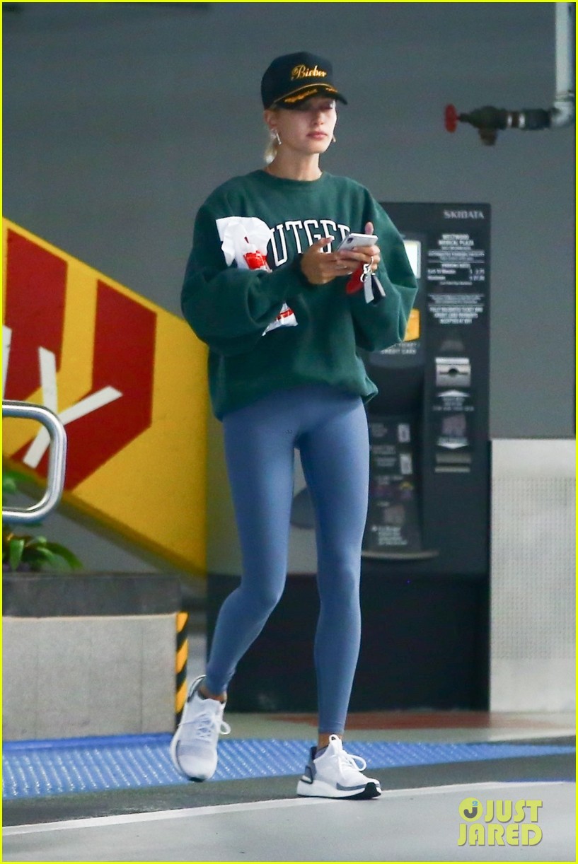 hailey bieber reps new last name on her baseball hat 01