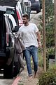 liam hemsworth strips out of his wetsuit after surfing 05
