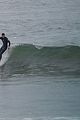 liam hemsworth strips out of his wetsuit after surfing 12