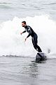 liam hemsworth strips out of his wetsuit after surfing 14