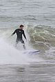 liam hemsworth strips out of his wetsuit after surfing 20
