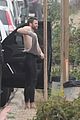 liam hemsworth strips out of his wetsuit after surfing 32
