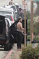liam hemsworth strips out of his wetsuit after surfing 33