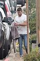 liam hemsworth strips out of his wetsuit after surfing 38