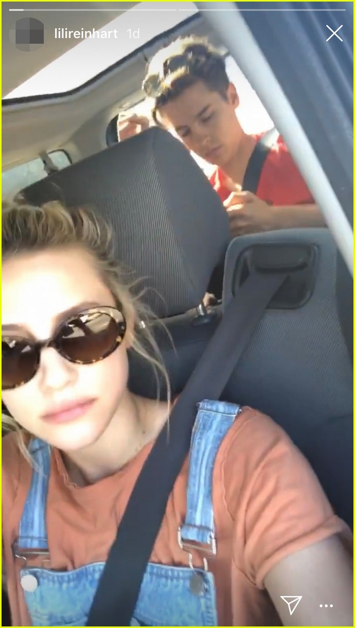lili reinhart catches cole sprouse playing with his hair 01