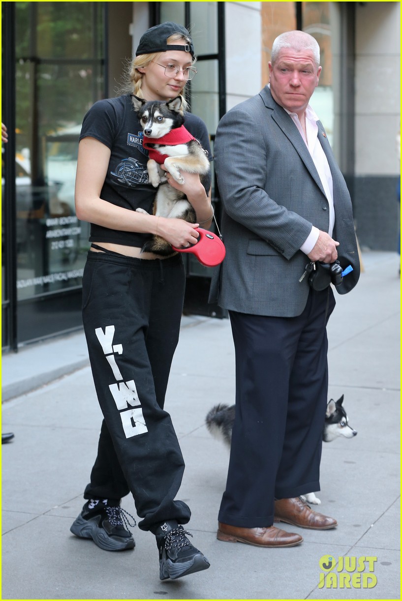 sophie turner cuddles one of her dogs while out in nyc 05