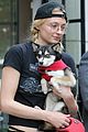 sophie turner cuddles one of her dogs while out in nyc 02