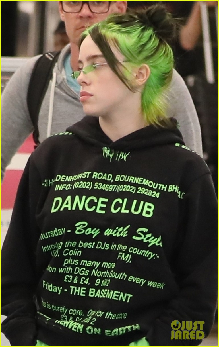 billie eilish shows off neon green hairat lax 04