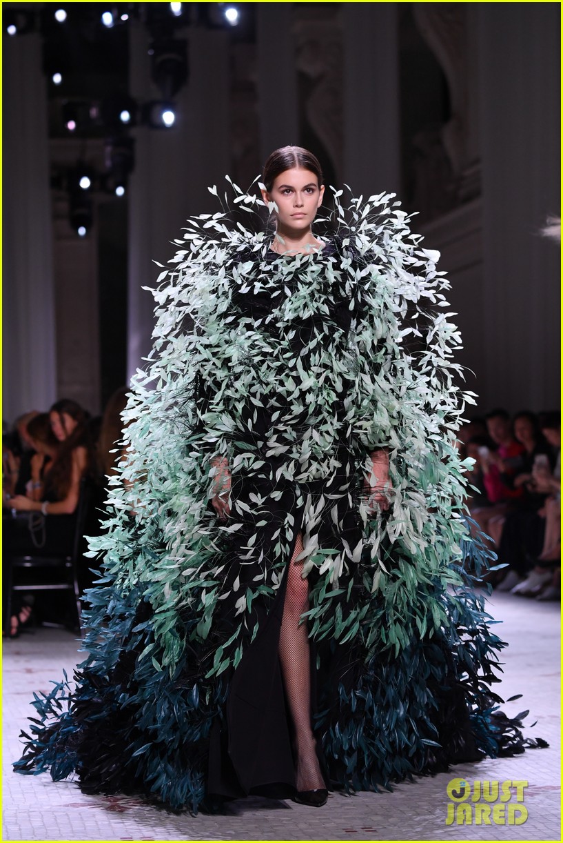 kaia gerber dons feathered frock for givenchy fashion show 01