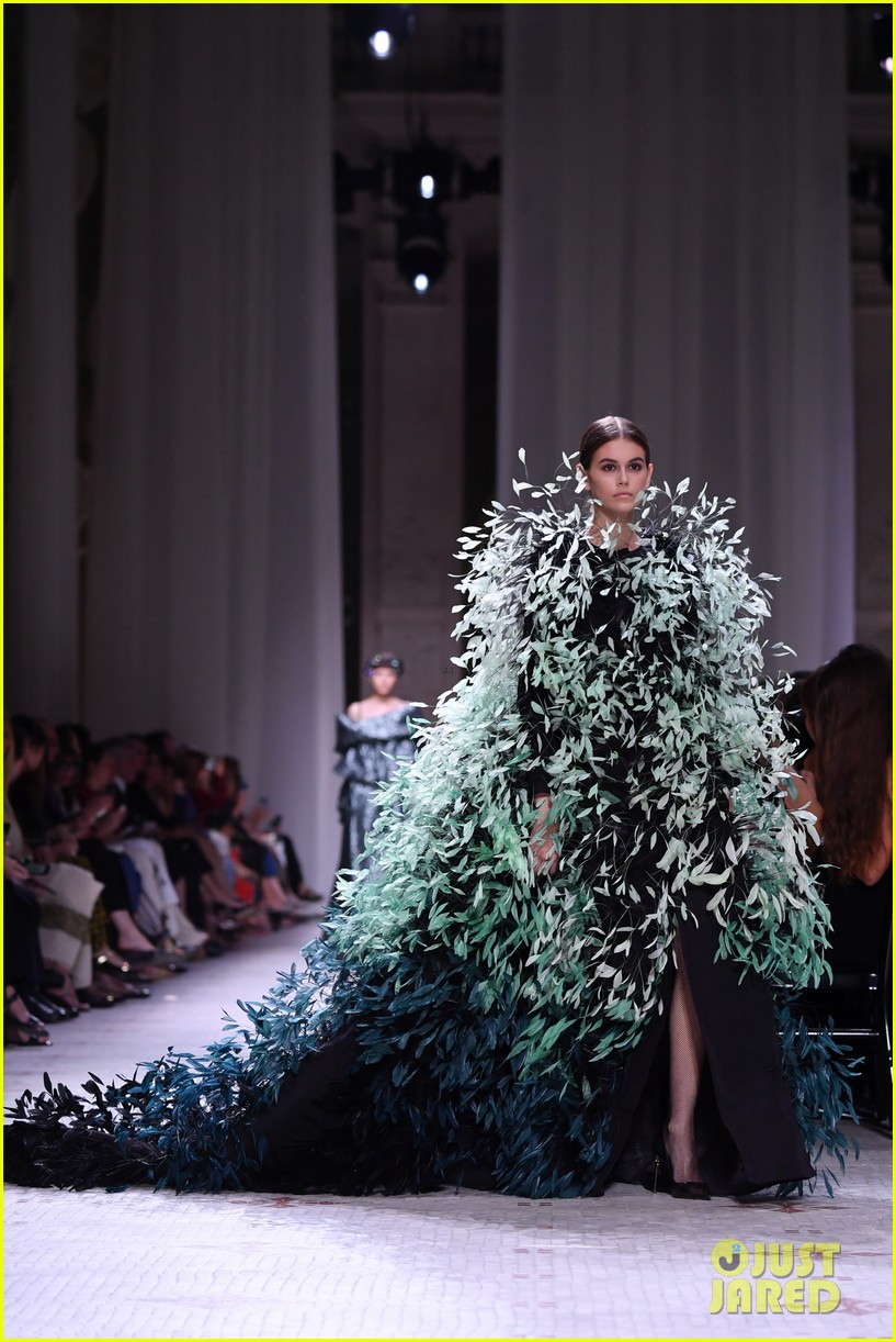 kaia gerber dons feathered frock for givenchy fashion show 03