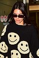 kendall jenner sports smiley face sweater for flight into lax 02