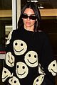 kendall jenner sports smiley face sweater for flight into lax 04
