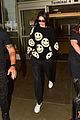 kendall jenner sports smiley face sweater for flight into lax 05