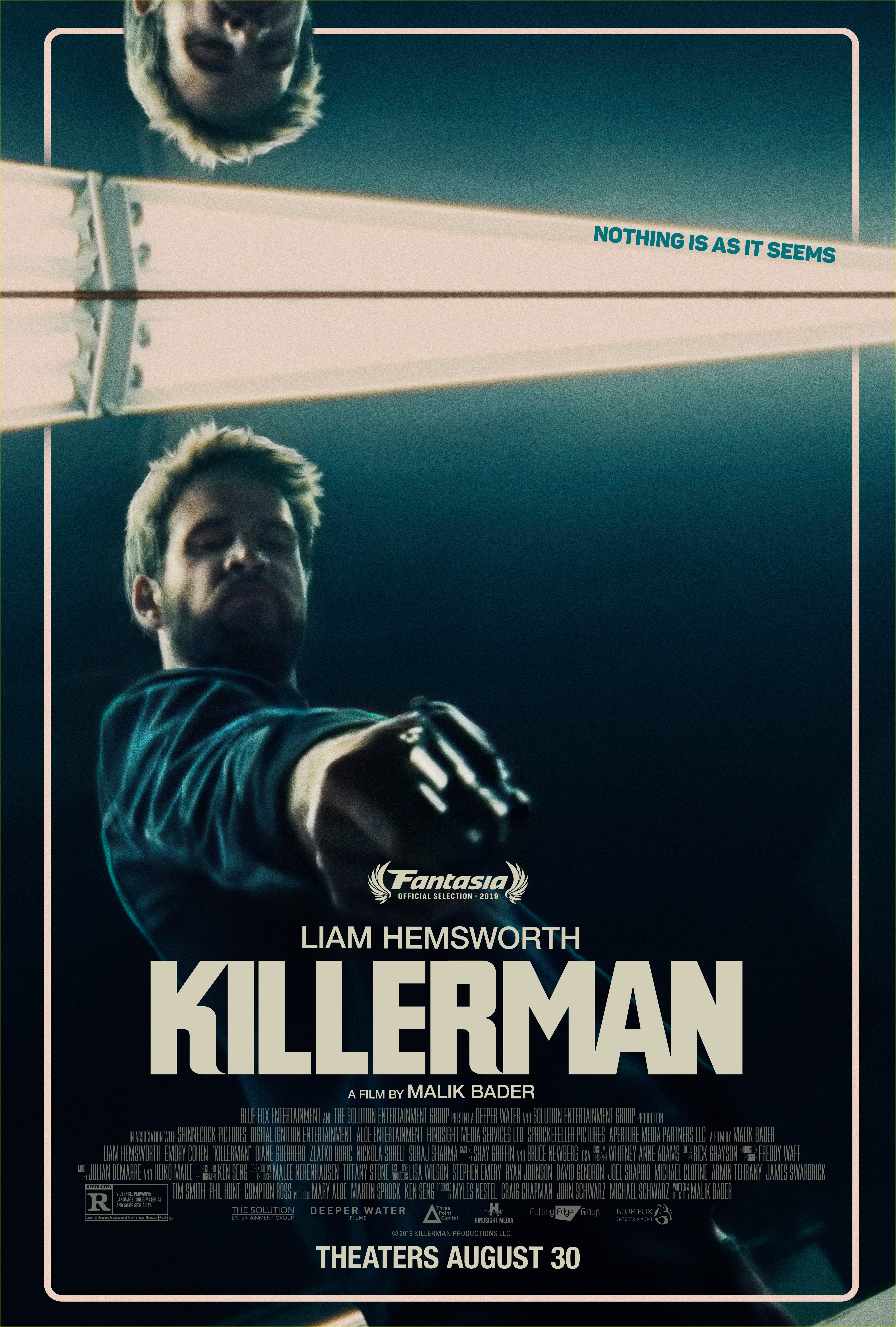 liam hemsworth new killerman poster