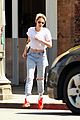 kristen stewart dons double denim for flight out of lax 01