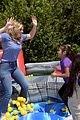 bailee madison lauren alaina help distribute backpackswith blessings in a backpack 08