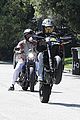 justin bieber popsa wheelie during his motorcycle ride 03