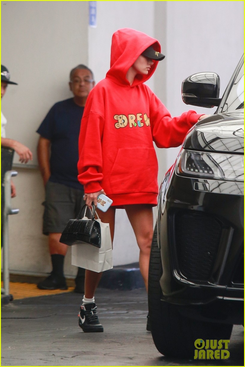 justin and hailey bieber pop in red outfits while running errands 05