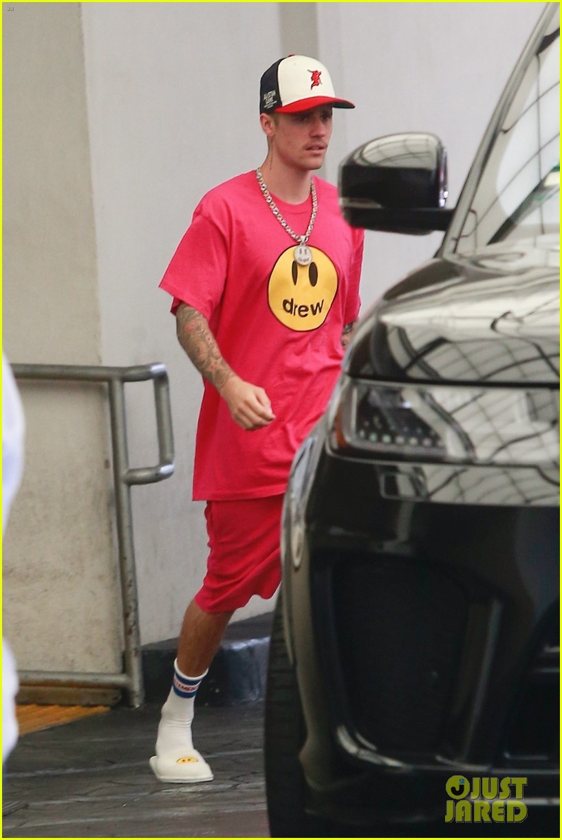 justin and hailey bieber pop in red outfits while running errands 06