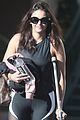 nina dobrev steps out on crutches after injuring her foot 02