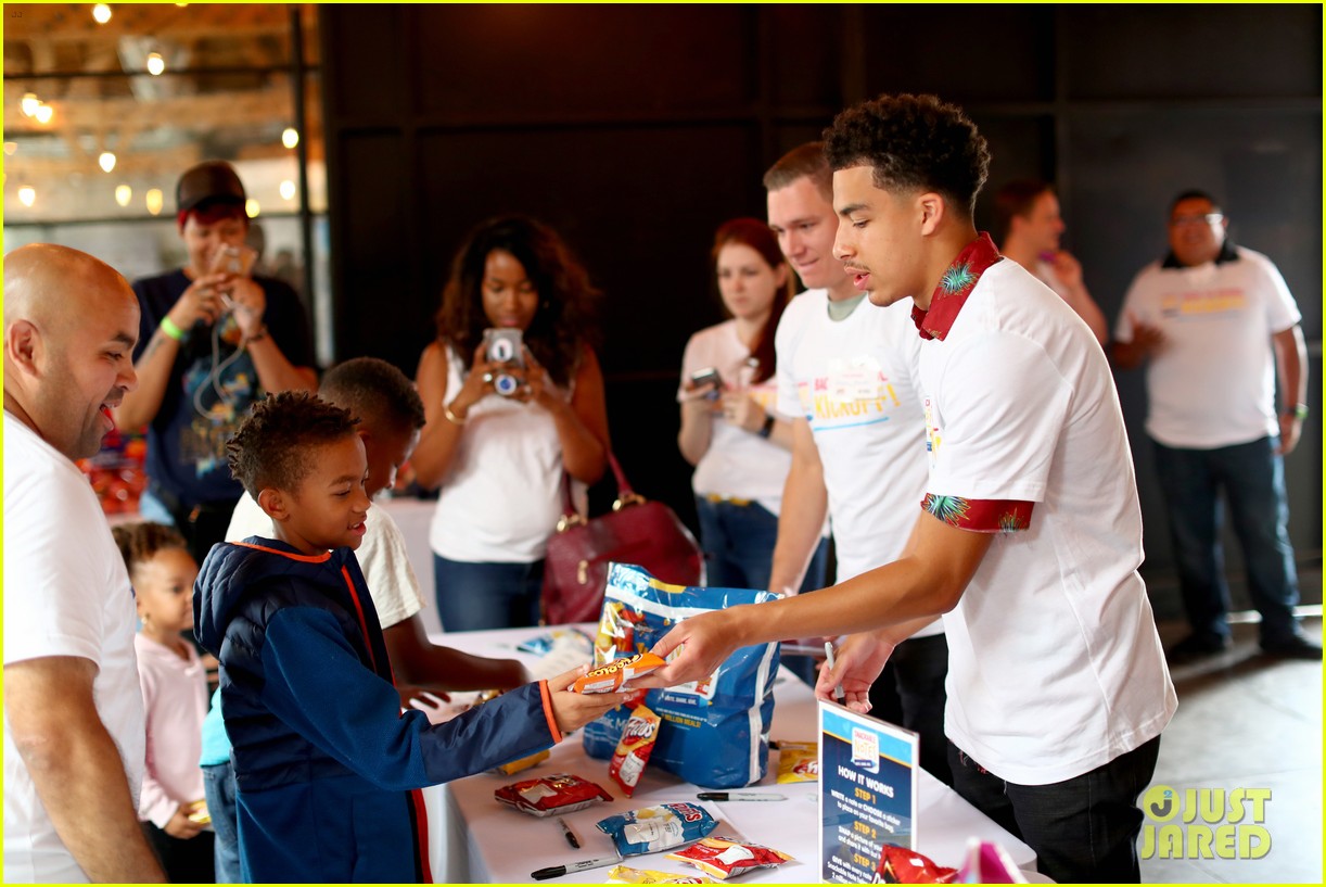 marcus scribner helps hand out food to families in need 07