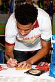 marcus scribner helps hand out food to families in need 09
